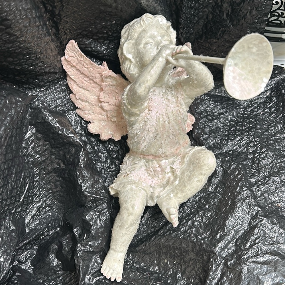 CHERUB. SIT ON LEDGE